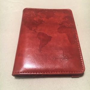 Passport holder with slots for cards